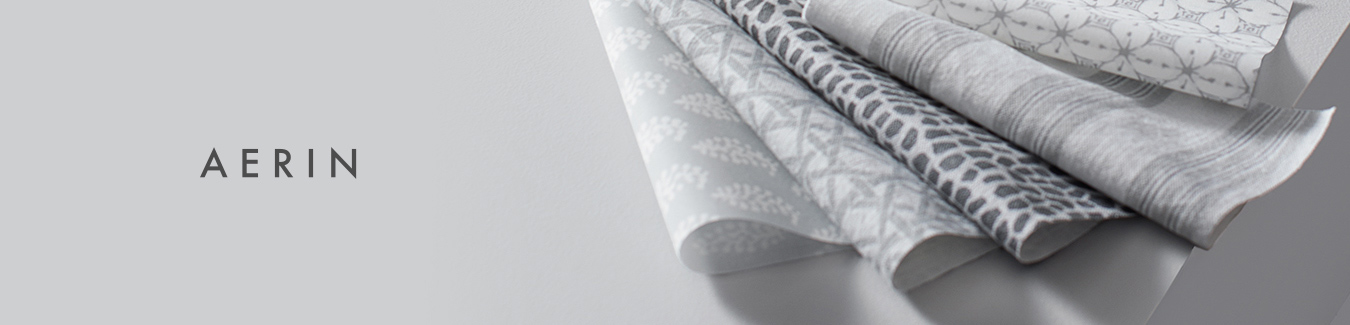 Aerin fabric swatches in various grey patterns