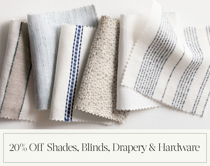 20% Off Shades, Blinds, Drapery & Hardware in black text over an image of various colored material swatches with stripes.
