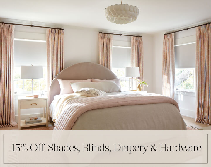 15% Off Shades, Blinds, Drapery & Hardware in black text over an image of Solar Shades in a white bathroom with a tub