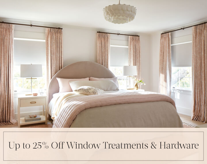 Up to 25% Off Window Treatments & Hardware in black text over an image of Blackout Drapery & Roller Shades in a bedroom