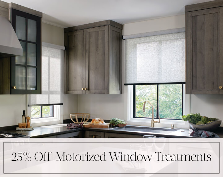 25% Off Motorized Window Treatments in black text over an image of kitchen windows dressed with cordless Solar Shades.