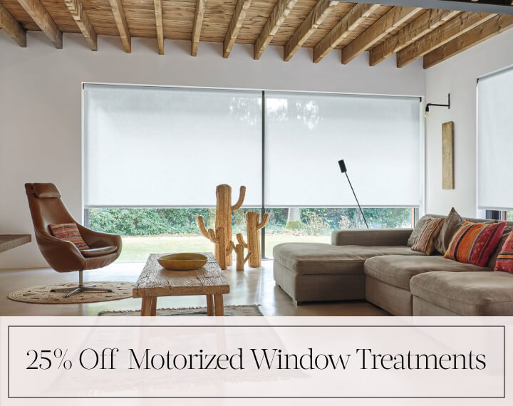 25% Off Motorized Window Treatments in black text over an image of living room windows with energy efficient Roller Shades.