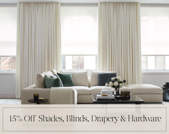 15% Off Shades, Blinds, Drapery & Hardware in black text over an image of Cellular Shades in a contemporary bedroom