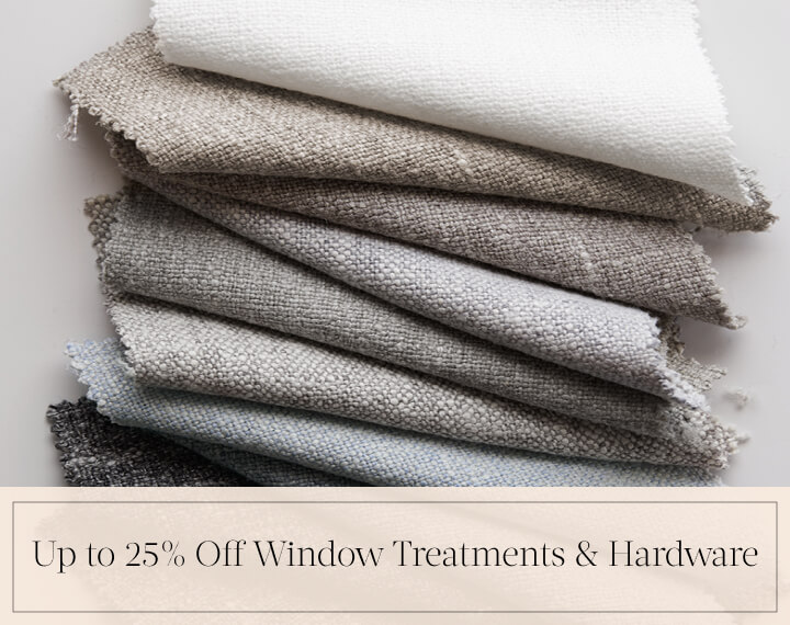 Up to 25% Off Window Treatments & Hardware in black text over an image of white swatches and trim placed on a white tabletop