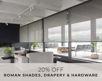 Solar Shades made of 5% metallic in zinc cover wall-to-wall living room windows with overlaid sales messaging