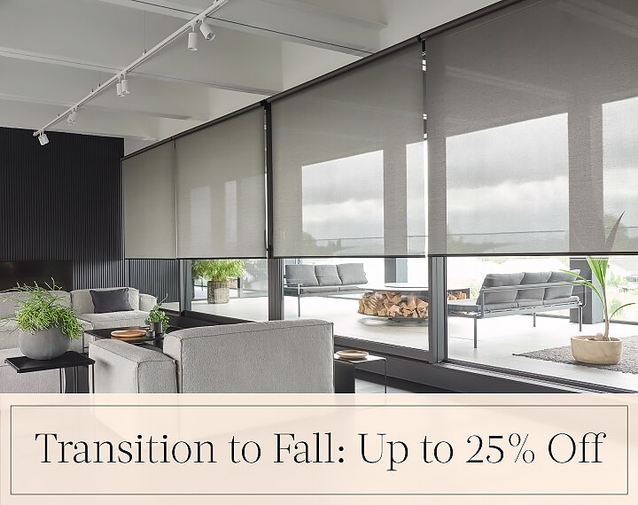 Transition to Fall: Up to 25% Off in black text over an image of a living room with Solar Shades made of 5% Metallic in Zinc