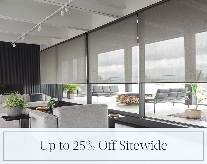 Up to 25% Off Sitewide in black text over an image of windows with light filtering Metallic Solar Shades.