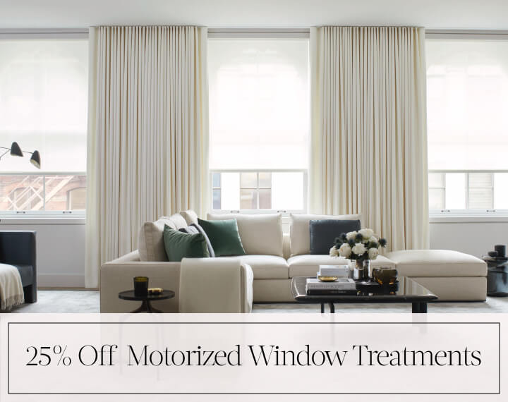 25% Off Motorized Window Treatments in black text over an image of Motorized Roman and Roller Shades in a family room