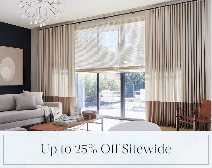Up to 25% Off Sitewide in black text over an image of windows with Woven Wood Shades and Drapery.