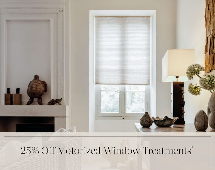 25% Off Motorized Window Treatments in black text over an image of a window with light filtering Cellular Shades.