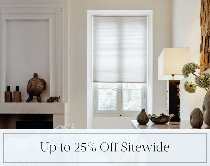 Up to 25% Off Sitewide in black text over an image of a window with light filtering Cellular Shades.