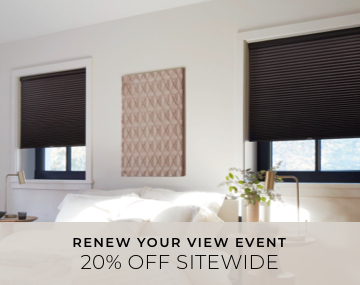 Blackout Cellular Shades in Midnight cover windows in a contemporary off-white bedroom with overlaid sales messaging