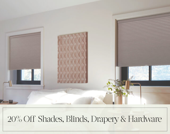 20% Off Shades, Blinds, Drapery & Hardware in black text over an image of Cellular Shades in a contemporary bedroom