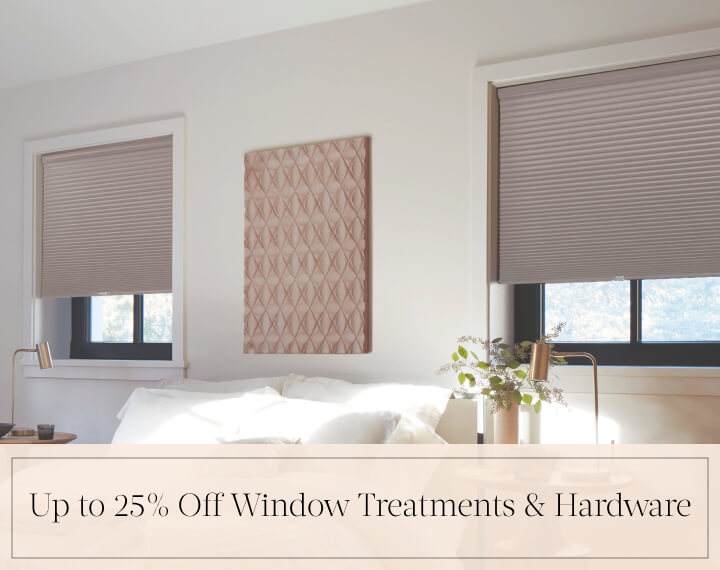 Up to 25% Off Window Treatments & Hardware in black text over an image of Cellular Shades in a contemporary bedroom