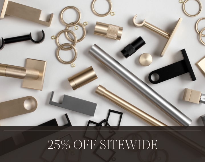 25% Off Sitewide in white text over an image of Tailored Pleat Drapery on bedroom patio doors.