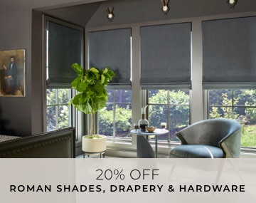 Flat Roman Shades made of Wool Blend in Charcoal cover tall windows in a grey bedroom with overlaid sales messaging