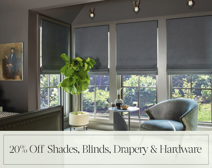 20% Off Shades, Blinds, Drapery & Hardware in black text over image of Flat Roman Wool Blend Fabric Shades on bedroom windows