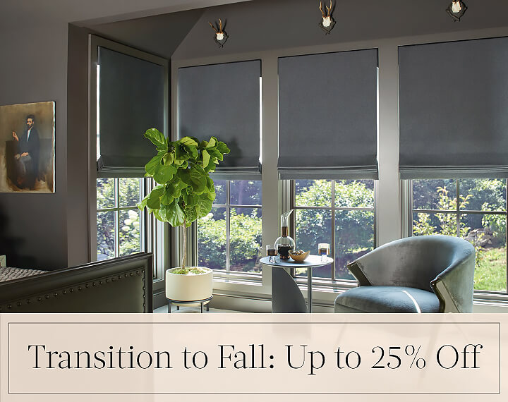 Transition to Fall: Up to 25% Off in black text over an image of Flat Roman Shades in Wool Blend fabric on bedroom windows