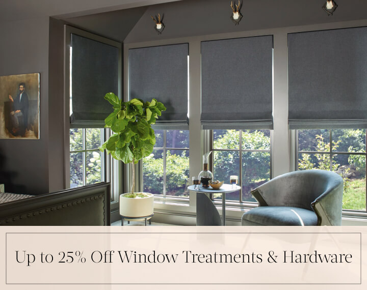 Up to 25% Off Window Treatments & Hardware in black text over image of Flat Roman Wool Blend Fabric Shades on bedroom windows