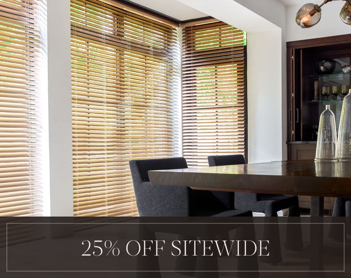 25% Off Sitewide in white text over an image of dining room windows with Champagne Metal Blinds.