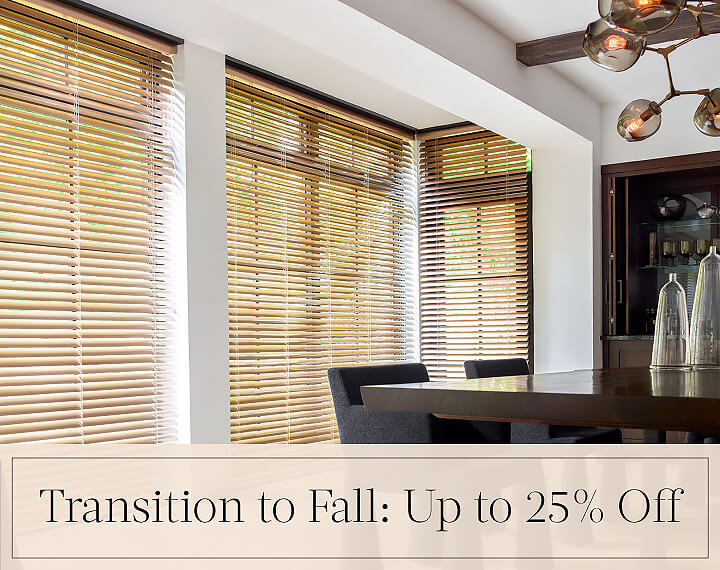 Transition to Fall: Up to 25% Off written in black text over an image of 2-inch Champagne Metal Blinds on dining room windows