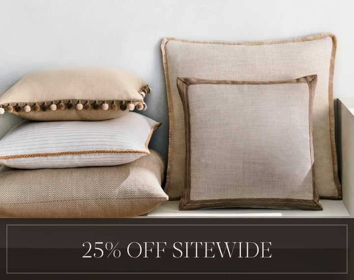 25% Off Sitewide in white text over an image of windows dressed with Drapery and Cornices.