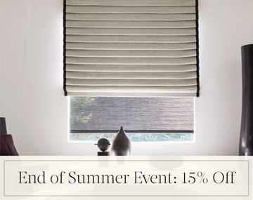 End of Summer Event: 15% Off written in black text over an image of a Pleated Roman Shade in Wool Blend in a room