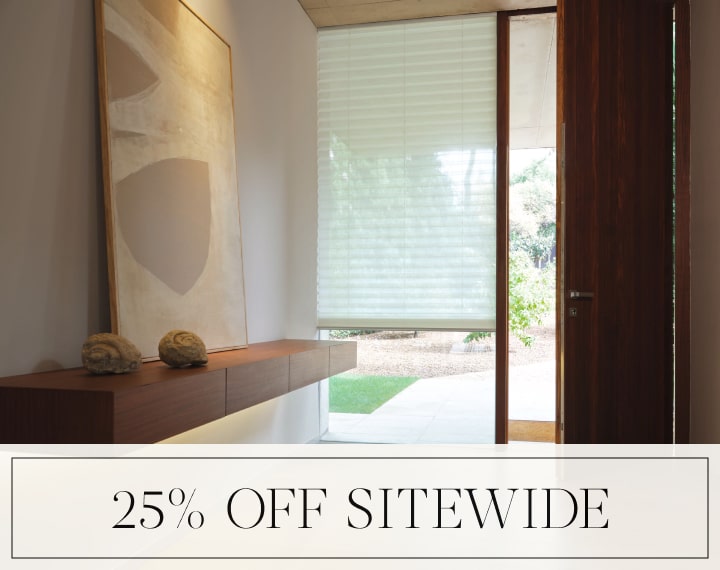 25% Off Sitewide in black text over an image of a window with a light filtering Pleated Shade.