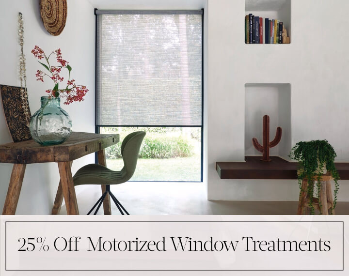 25% Off Motorized Window Treatments in black text over an image of an office with a desk and window with grey roller shades.