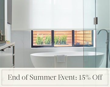 End of Summer Event: 15% Off written in black text over an image of Solar Shades in a white bathroom with a freestanding tub