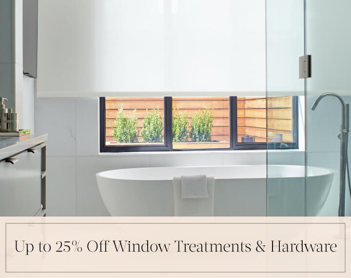 Up to 25% Off Window Treatments & Hardware in black text over an image of Solar Shades in a white bathroom with a tub