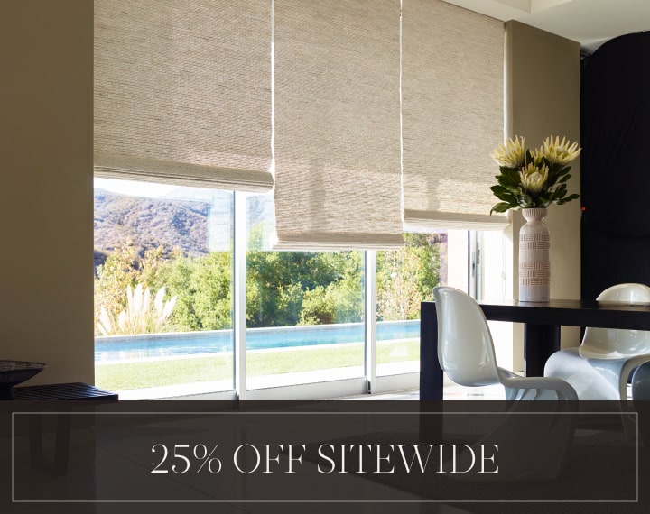 25% Off Sitewide in white text over an image of a room with glass doors with Woven Wood Shades.