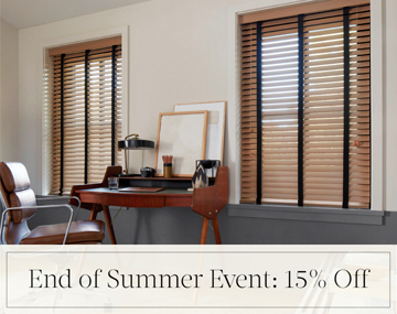 End of Summer Event: 15% Off written in black text over an image of Oak Wood Blinds in an office with a wood desk and chair