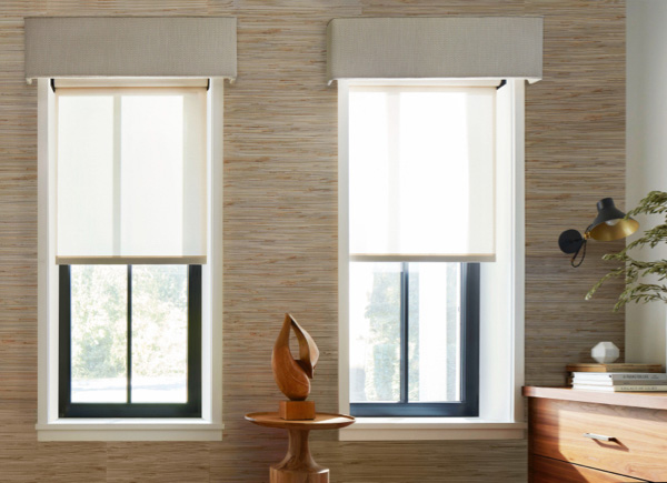 Deep windows on walls with a textured wallpaper feature custom cornices with welts over Roller Shades